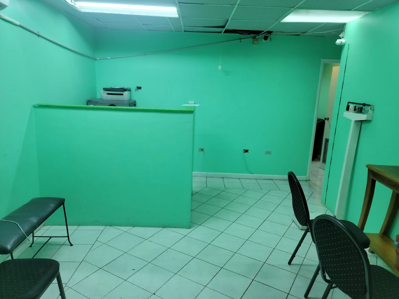 Reception and waiting area inside Carib Care Medical Centre